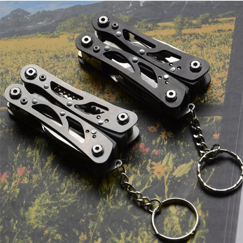 Compact foldable tactical survival tool with multifunction capabilities, made from durable 420 stainless steel for outdoor and emergency use.